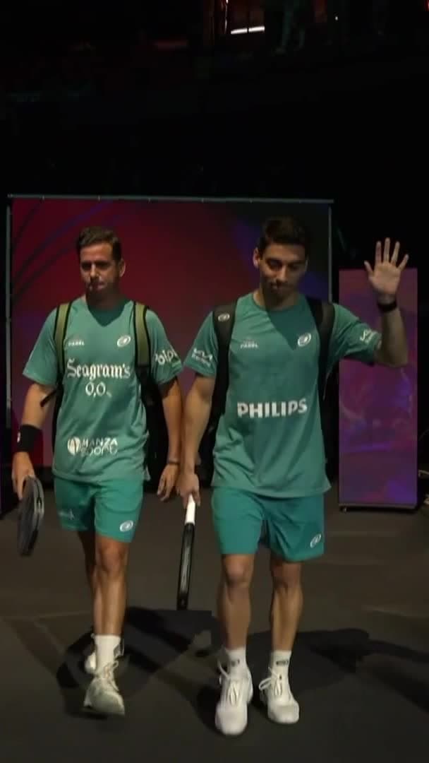 Navarro and Di Nenno enter the court
