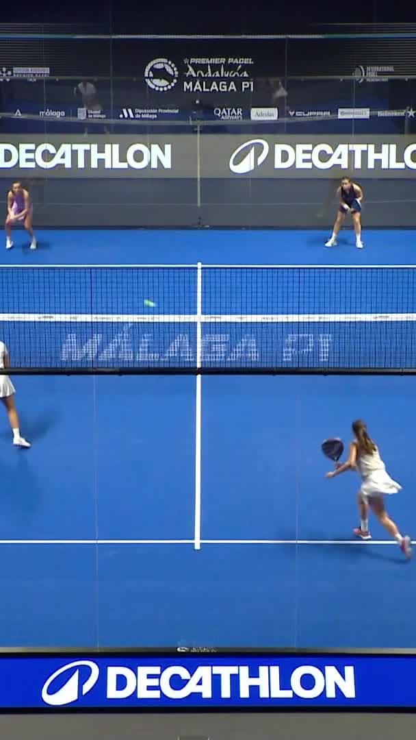 Ortega hits a sharp backhand volley