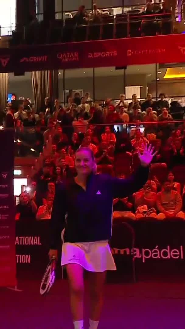 Entrance onto the court by the Sanchez - Ustero pair